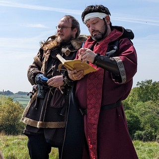 A barbarian and a priest contemplate the scenery. A barbarian and a priest contemplate the scenery.